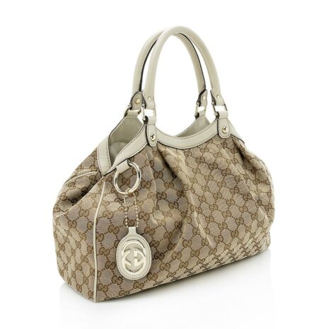 Gucci-GG-Canvas-Sukey-Medium-Tote_123595_right_angle_0_parent