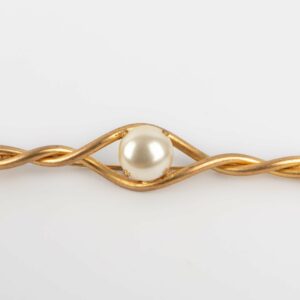 Broche dorée Chanel