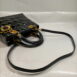 christian-dior-black-enamel-hand-bag-106006