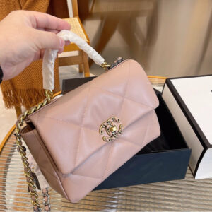 Pink Chanel woman handbag