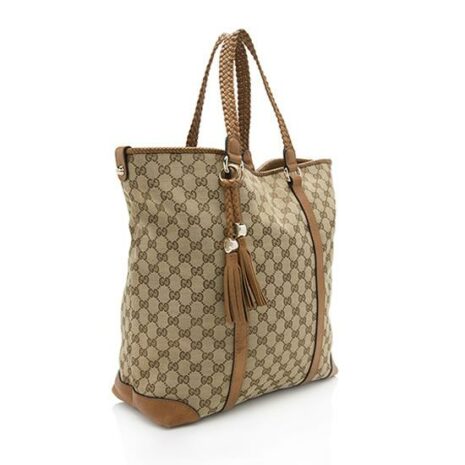 Gucci-GG-Canvas-Marrakech-Tote_106368_right_angle_0_parent_d18e1655-2369-4eec-ab9d-2adc0f75be7d