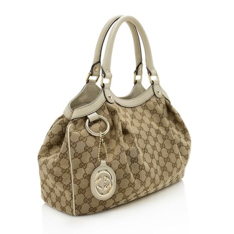 Gucci-GG-Canvas-Sukey-Medium-Tote_126296_right_angle_0_parent