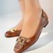 Women's leather block heel pumps in brown colour with croc texture and gold horseshoe buckle with leather fringe by JULKE
