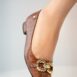 Women's leather block heel pumps in brown colour with croc texture and gold horseshoe buckle with leather fringe by JULKE