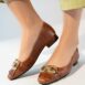 Women's leather block heel pumps in brown colour with croc texture and gold horseshoe buckle with leather fringe by JULKE