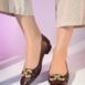 Women's leather block heel pumps in burgundy colour with croc texture and gold horseshoe buckle with leather fringe by JULKE