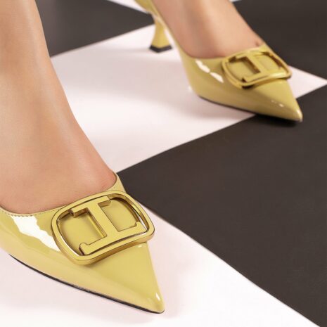 Women slingback heels in light yellow colour with logo buckle by JULKE