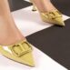 Women slingback heels in light yellow colour with logo buckle by JULKE