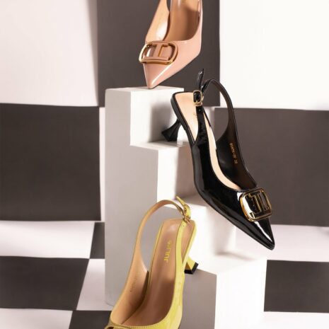 Women slingback heels in yellow, pink & black colours with logo buckle by JULKE