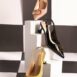 Women slingback heels in yellow, pink & black colours with logo buckle by JULKE