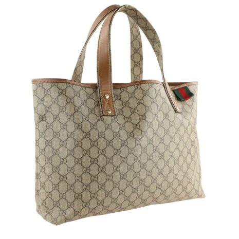 gucci-large-gg-brown-coated-canvas-tote-1-1-960-960_f08a2cfb-4623-4b6b-beac-e15919513e82