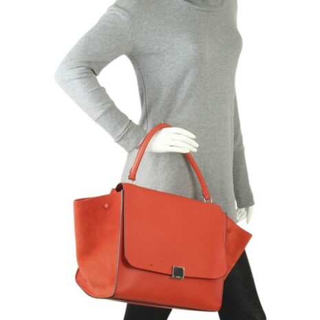 celine-trapeze-156041-orange-leather-satchel-1-0-960-960_e6d41dcf-dec0-46d7-9799-e4601169cfeb