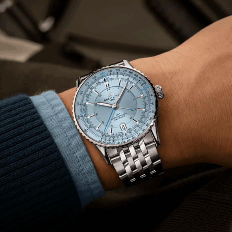 navitimer-41-gmt-a32310171c1a1-ice-blue-metal-bracelet-wrist-shot-ecom